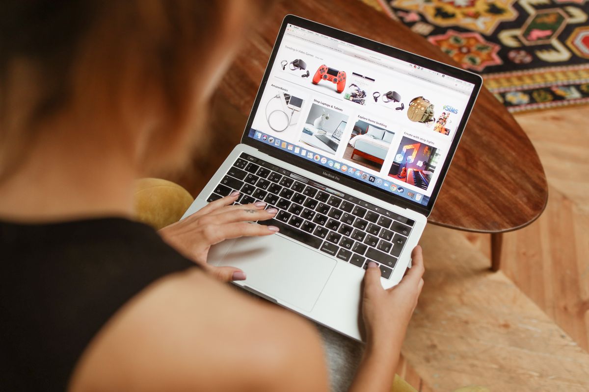 Person shopping on an online store, protected by website terms and conditions